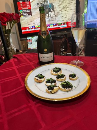 Happy Derby Day.  My snack while handicapping the races - Osetra Caviar w/Creme Fraiche blinis and of course Bollinger 