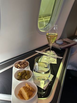 Pre departure canapés and a mystery sparkling wine. 