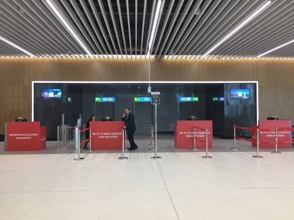 Gate G2 with fresh flowers awaiting departing passengers