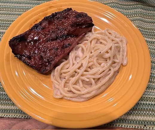 Skirt steak grilled with Sweet Baby Ray’s Sweet ‘n  Spicy and a side of cacio e pepe