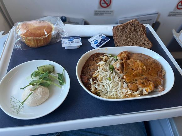 Butter Chicken 
First 30 mins seatbelt sign, flight left 30 mins late and longer flight route but good crew