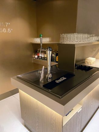 The lounge is set up so that in theory it could offer a staffed bar, but in practice it’s self service. The draft Heineken is an addition over Aspire