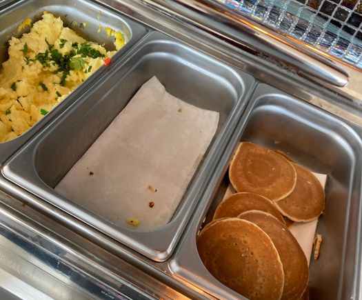 Already devoured : guess the middle section had waffles or bacon or sausages ?