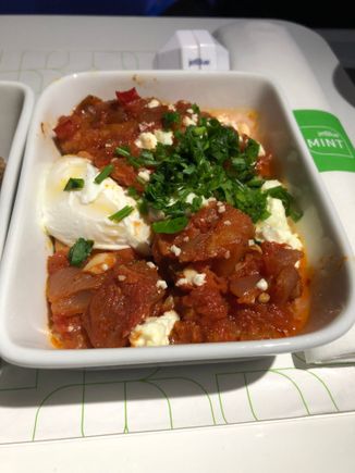Eggplant Shakshuka - poached egg (totally cooked through, unfortunately), feta, herbs.