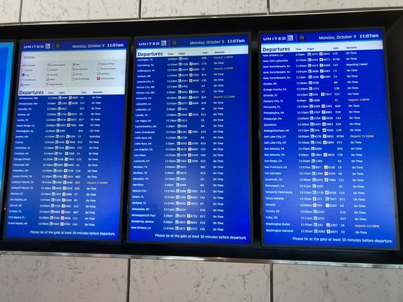 The lounge has a departures board but no calls are being made, except the call that people should offer their extra seats as the lounge was getting at capacity 
