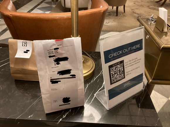 Doordash orders are left on a designated table opposite reception