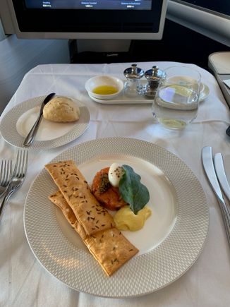 Loch Fyne smoked salmon tartare with smoked mayonnaise, seeded cracker and quail egg
