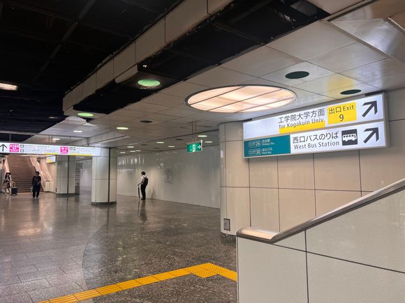 Follow sign to west bus station exit 9.  You go upstairs.  There is a building under construction on your left.  Walk along with it in your left and round the corner.