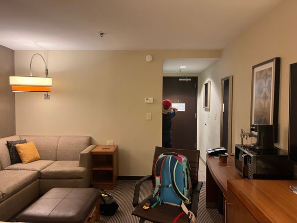 Sitting area; desk with microwave

