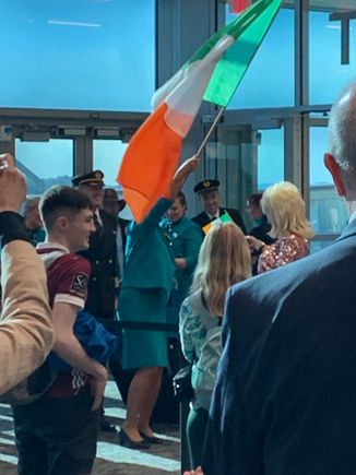 The crew waving the Irish flag to a huge applause 