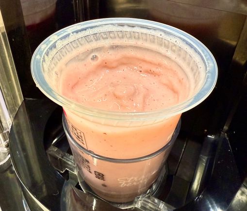 Fresh smoothy from 7-Eleven. Pick your cup containing various fruits from the freezer, put it in the machine where it adds milk, and blends. Really good!