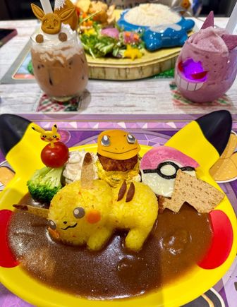 My (Pikachu) plate contained a small hamburger slab of chicken. The Snorlax plate in the background was chicken and rice.