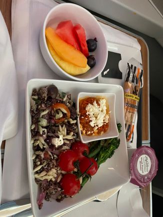 The pre landing meal was excellent. Broccolini and a blistered tomato roasted red pepper puree. 