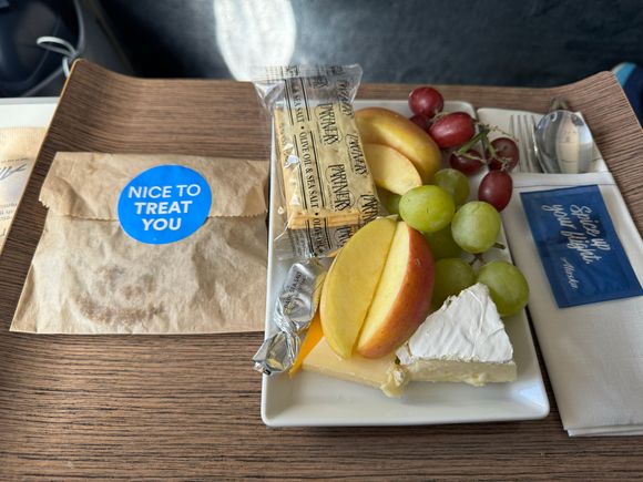 Snagged the last fruit and cheese platter because someone decided the load the flight with a dozen KBBQ disaster sandwiches. I really wanted the salad. :(
