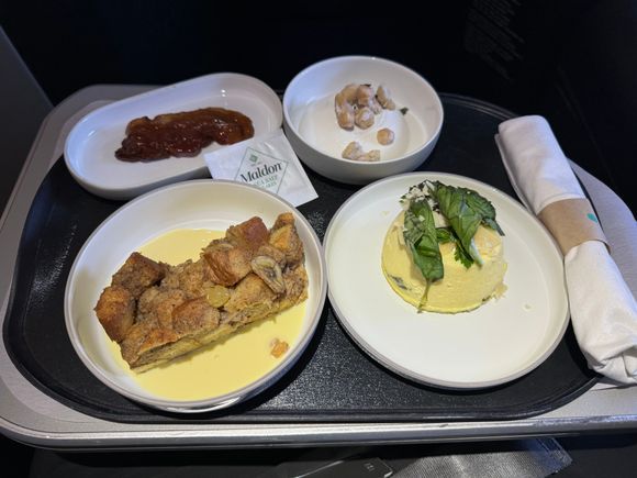Maple glazed bacon, yogurt, frittata, bread pudding