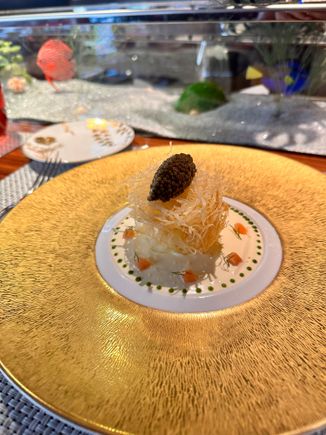 Egg, potatoes and caviar. 