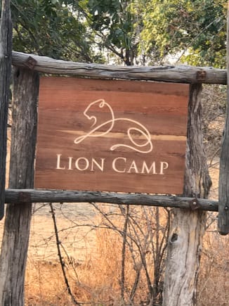 Sign as you approach camp