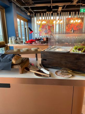 Hot and cold options - staff toasts bread. 
