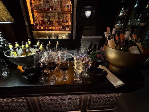 Location can be Fitz's bar or the upper gallery overlooking to zodiac dial.