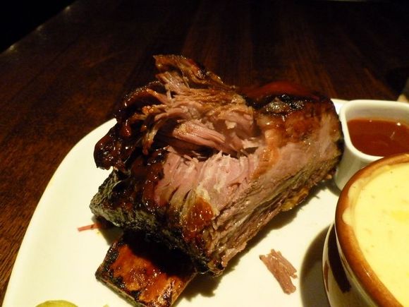 The crown prime beef rib at Jack Stack, with a cheesy corn bake