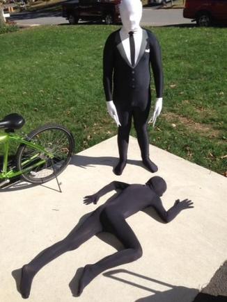 10262014 Daeton in black morph suit on ground and Tony in slenderman suit