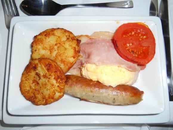 BA247/02Dec LHR-GRU, Breakfast

Traditional English breakfast of scrambled eggs, Suffolk sweet-cured bacon, free-range Cumberland pork sausage, tomato and hash-brown potatoes