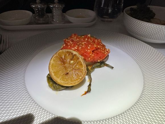 Sea Bass Main, slathered in sauce, which couldn't rescue it.  Edible+