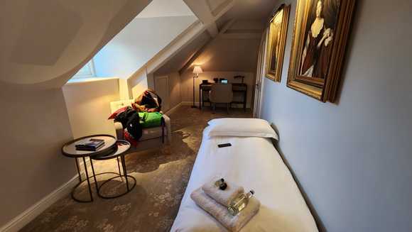 Can u call this a living area of a suite? more suitable as a  Loft , for storage