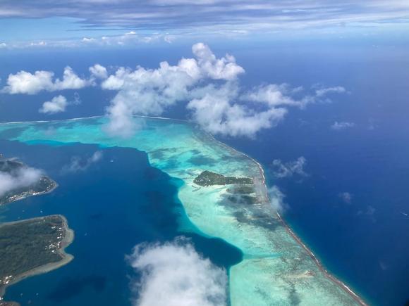 Spectacular view over Le Taha'a Resort on Motu Tautua on our approach to Bora Bora