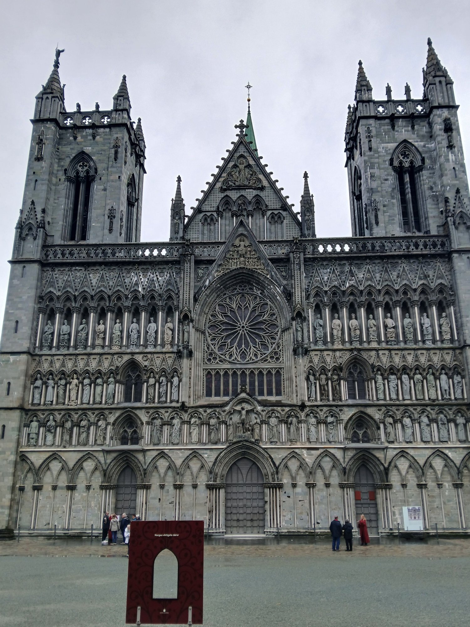 The ornate facade, Gothic and Romanesque architectural styles