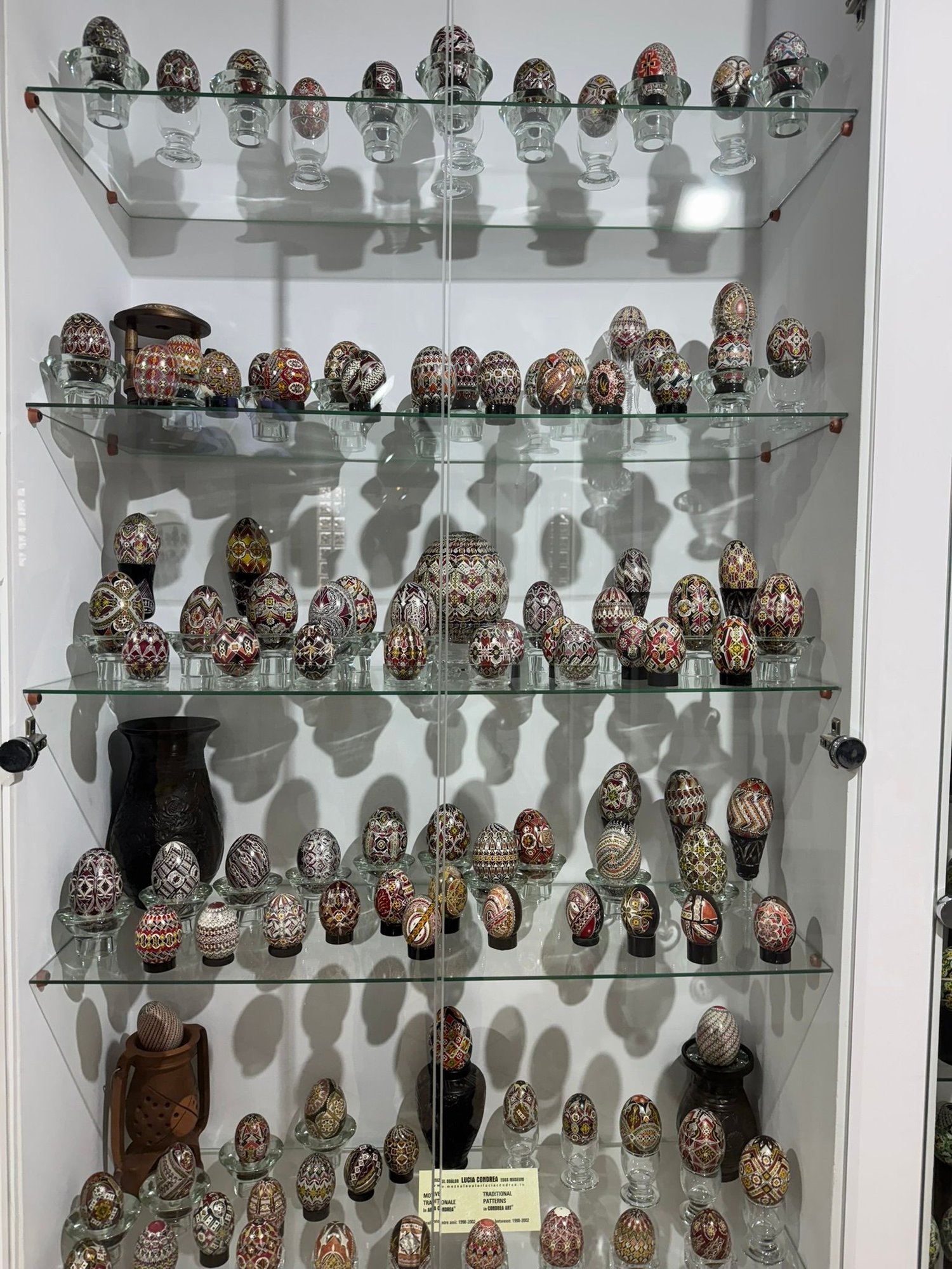 This is just a very small sample of the painted eggs at Muzeul Oualor Lucia Condrea. There were numerous rooms that went on and on. Each room housed glass cases like the above, with many, many shelves, just filled with the painted eggs. 