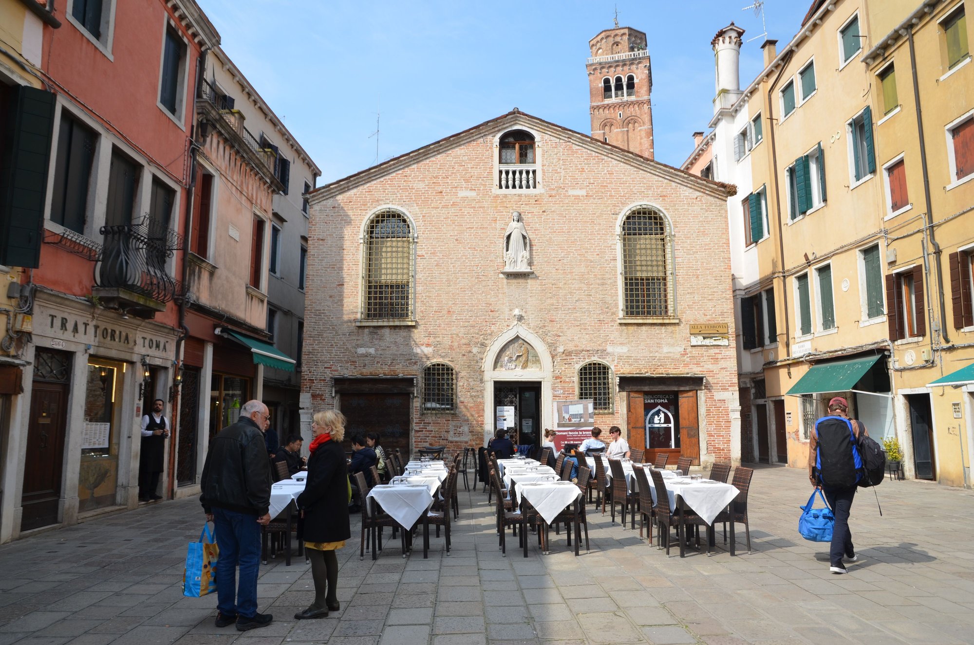 Campo San Tom� with public library and campanile of Frari church