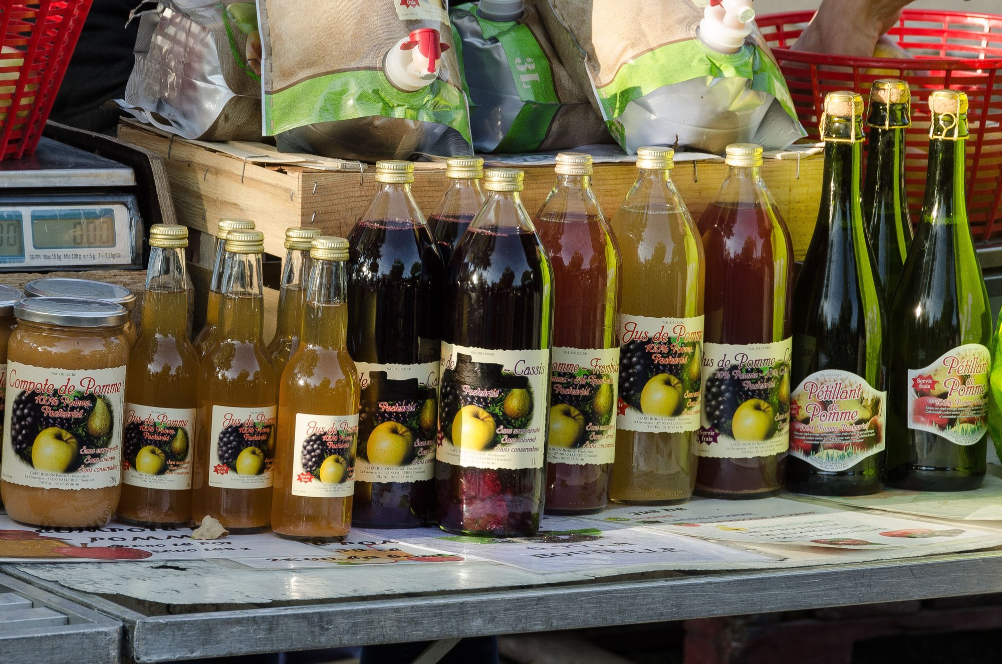 Some fresh fruit juices for sale in Azay.