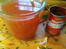 A spoon of tomato paste dissolved in warm water goes into the pot. I use no salt added paste.