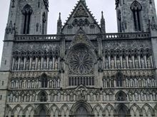 The ornate facade, Gothic and Romanesque architectural styles