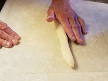 Rolling the dough into narrows strips