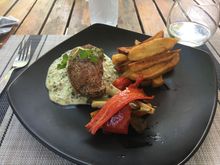 Pork tenderloin.  Swiss chief.  The sauce was an herb sauce to die for.