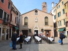 Campo San Tomà with public library and campanile of Frari church