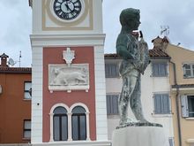 City hall tower with the little boy statue at Tito Square