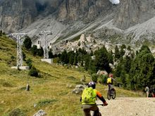 Bikers under the telecabin lifts