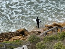 Surfer at Winki Pop Beach