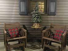 My side porch. Only Christmas stuff I’ve bought this year were these pillows. $5 each, Walmart—-and perfect I think. 