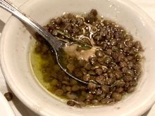 The oil served with the bread had lentils in it