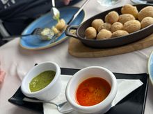 Patatas arrugadas, the celebrated "wrinkled potatoes" of Las Canarias.   Served with two mojos, the red and the green.   Not difficult to make, and later that week I was treated too a private lesson in making mojo rojo, and that was a highlight of the trip for me.  People could not have been kinder!