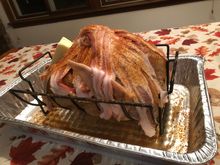 looks like bacon wrapped on bacon with a toothpick holding it all together.