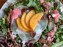 Wednesday restaurant salad. Odd white layer under nectarines is finely shaved lauer of harukai turnip. Pretty tasteless. Small diced beets were good.