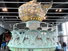 The original torch inside the visitors center 