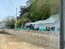 The terrace and its tiny beach