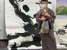 She uses many brushes, this being the largest.