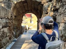 My son taking photos inside Roman Theater